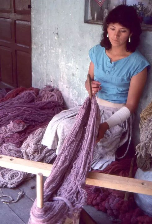 Edwin Sulca’s wife twining yarns together that have been dyed with different shades of cochineal, 1986.