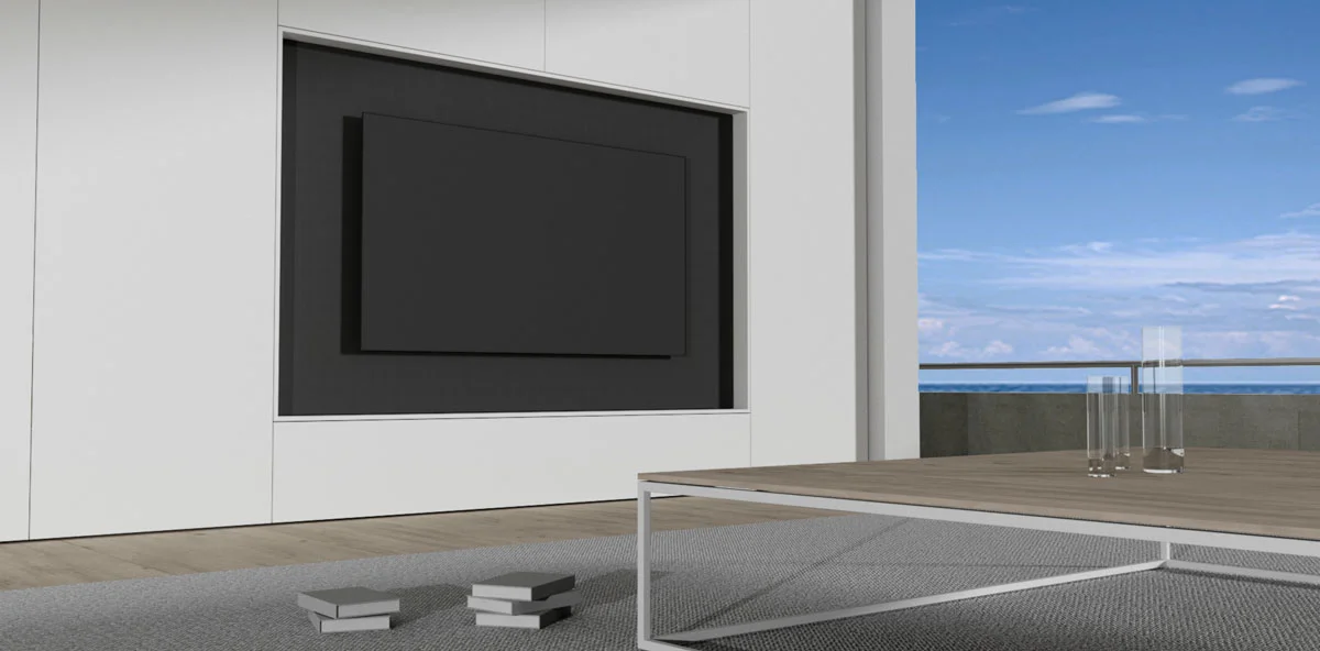 TV module geïntegreerd in de kastenwand. Het paneel waaraan de kast hangt is een deur bespannen met luidsprekerdoek.