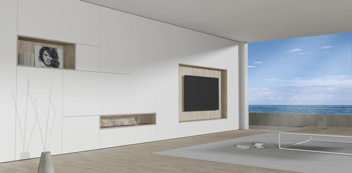 Afbeelding van een kamer ingericht met een inbouw kastenwand op maat.