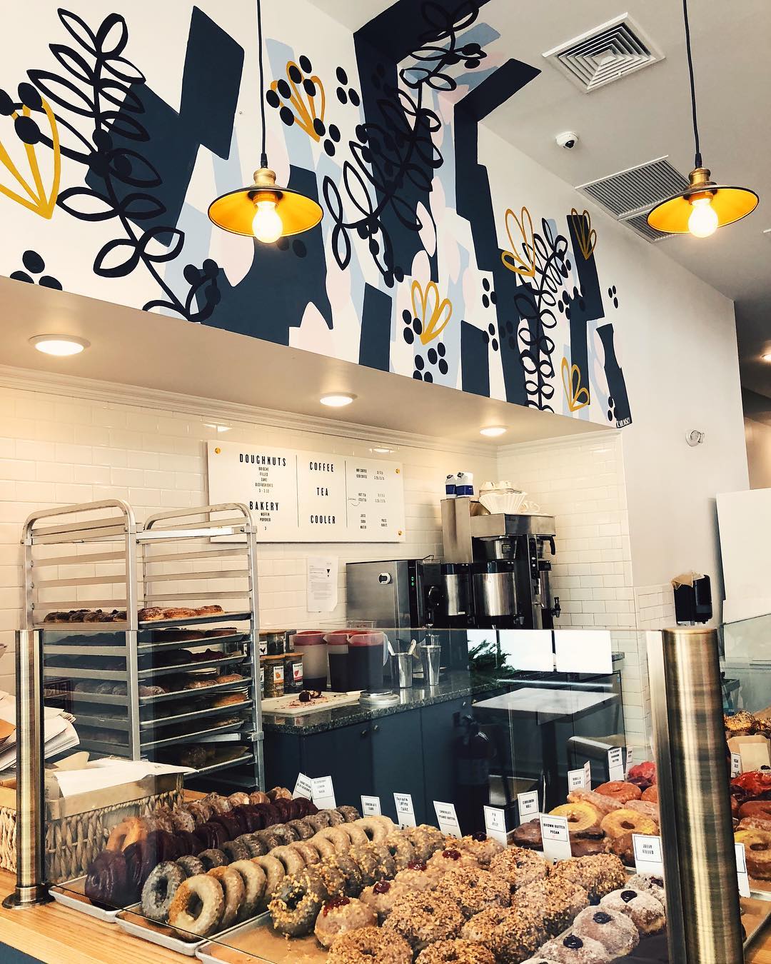  Commissioned mural for Knead Doughnuts at 32 Custom House in Providence, Rhode Island. This piece was designed and painted by hand in May 2018.     