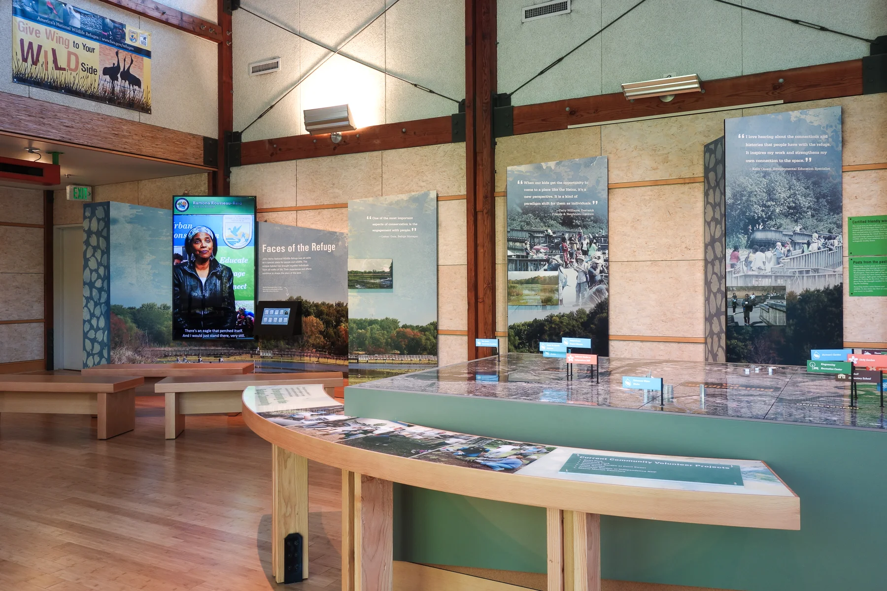 Sequential panels feature a landscape mural and stylized photos of visitors enjoying the refuge. An AV program elaborates on their stories.