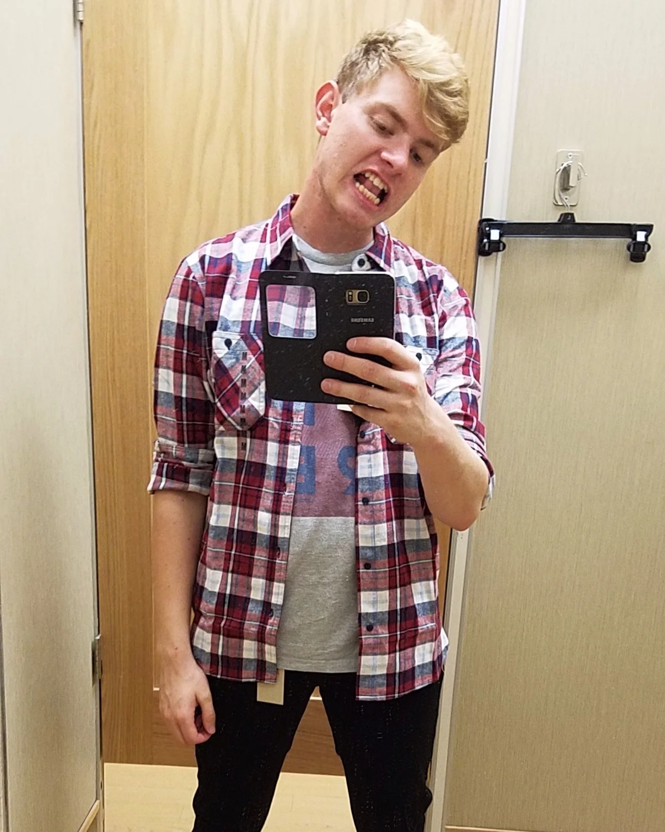 Trying on clothes on my way home from work. -2017