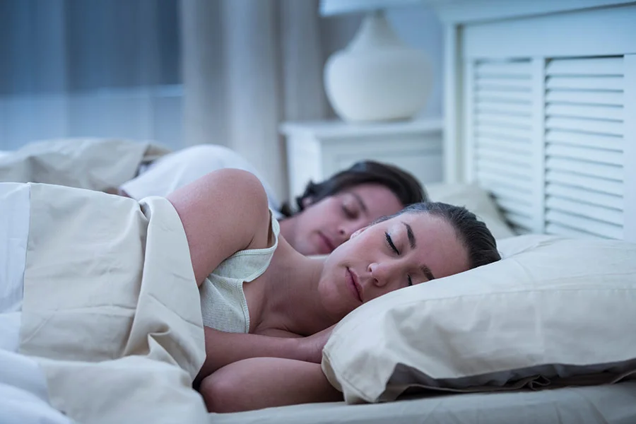 Young couple getting a good nights sleep