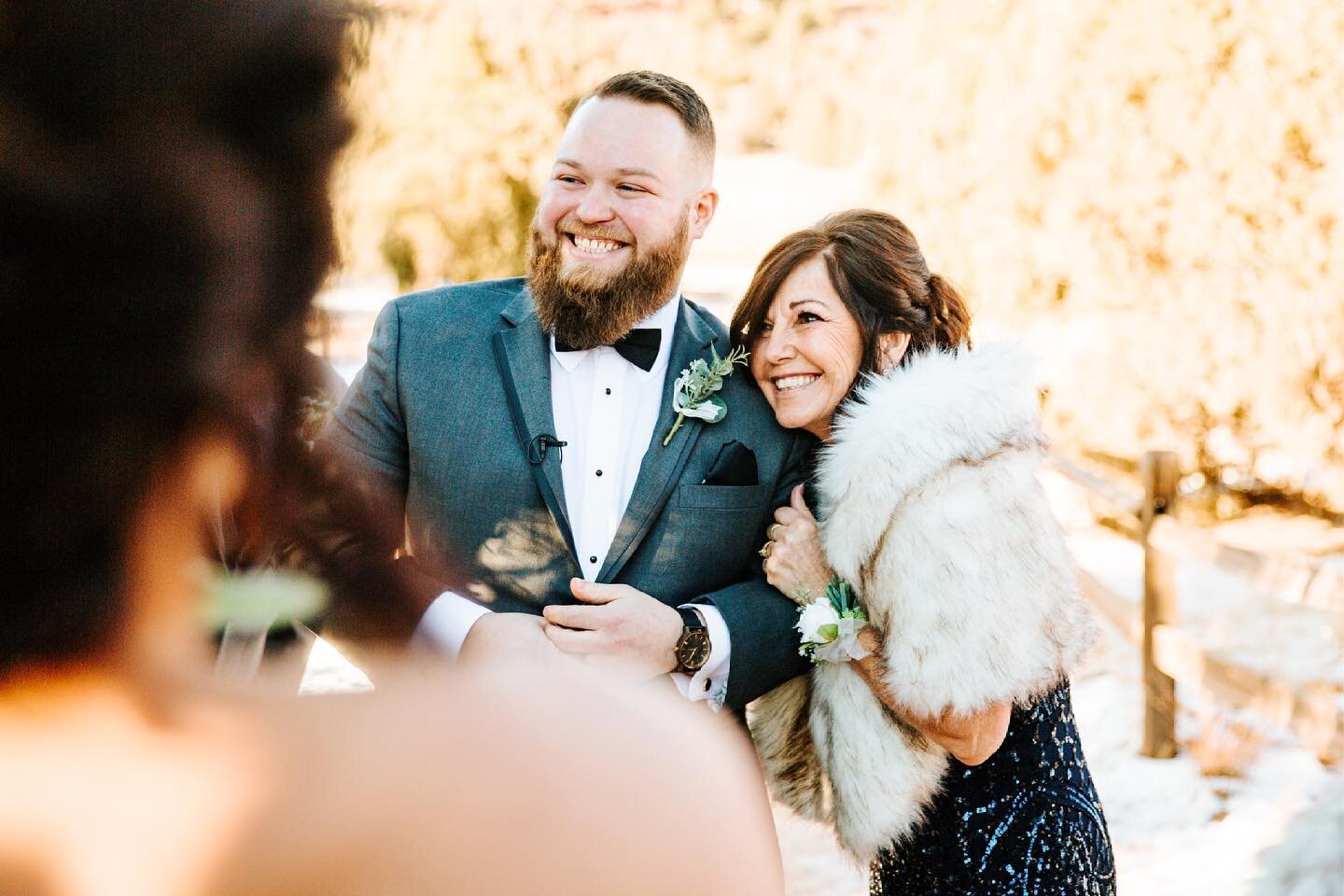 One of my favorite photos from Zach and Bradi&lsquo;s NYE wedding in Colorado Springs! It&rsquo;s hard to see in this photo, but if you look at Zach&rsquo;s hands, you&rsquo;ll notice him twisting his new wedding ring around. This is so subtle, but it&rsquo;s actually one of my favorite parts about a wedding day! I ALWAYS notice the groom twisting around the new ring on his finger and I don&rsquo;t know why, but it makes me smile every time! And then there&rsquo;s the bride&rsquo;s sweet mama hugging on her new son-in-law. How can you not love this photo?!