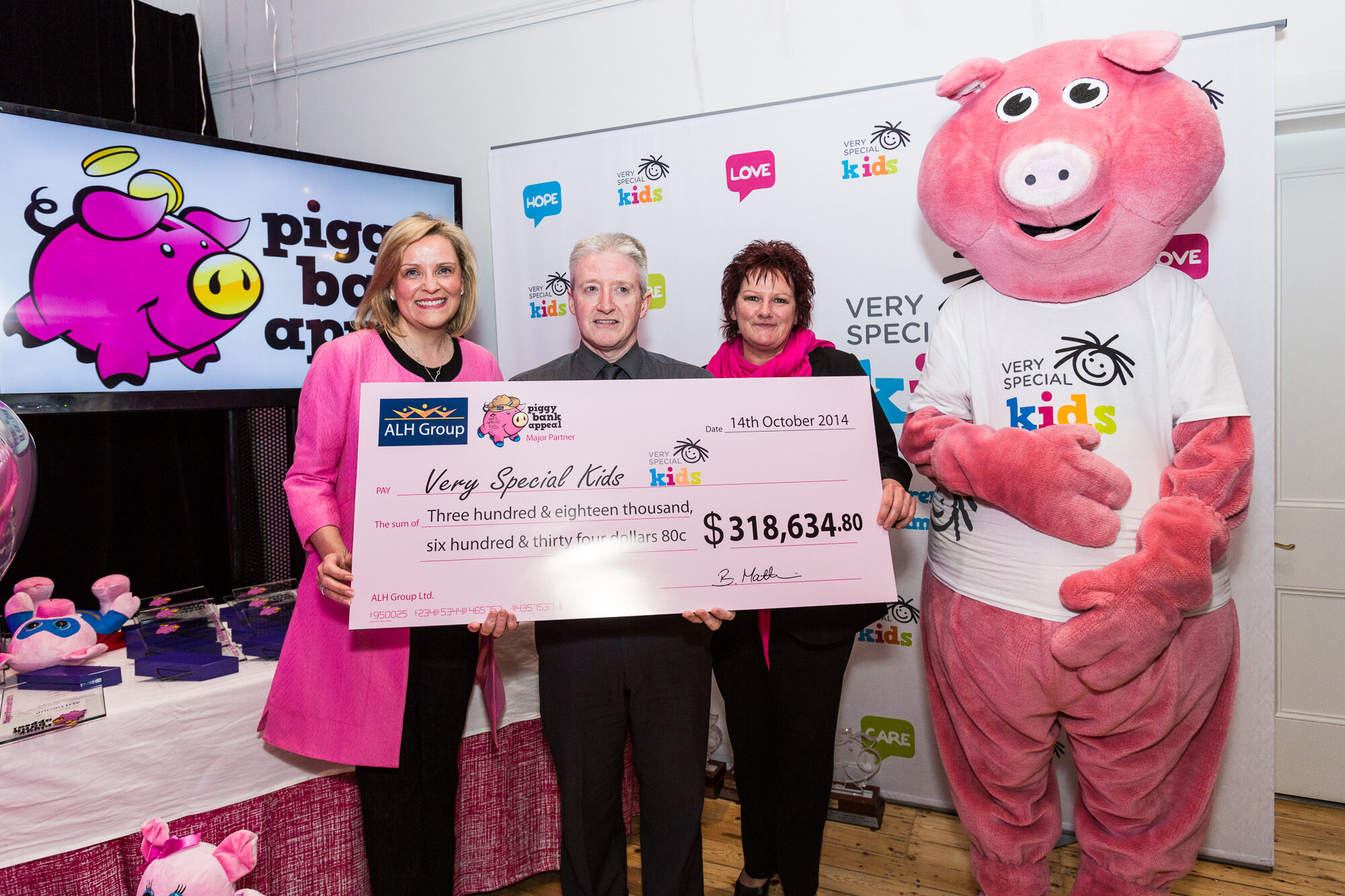 ALH Group giant cheque presentation with CEO Sarah Hosking.jpg
