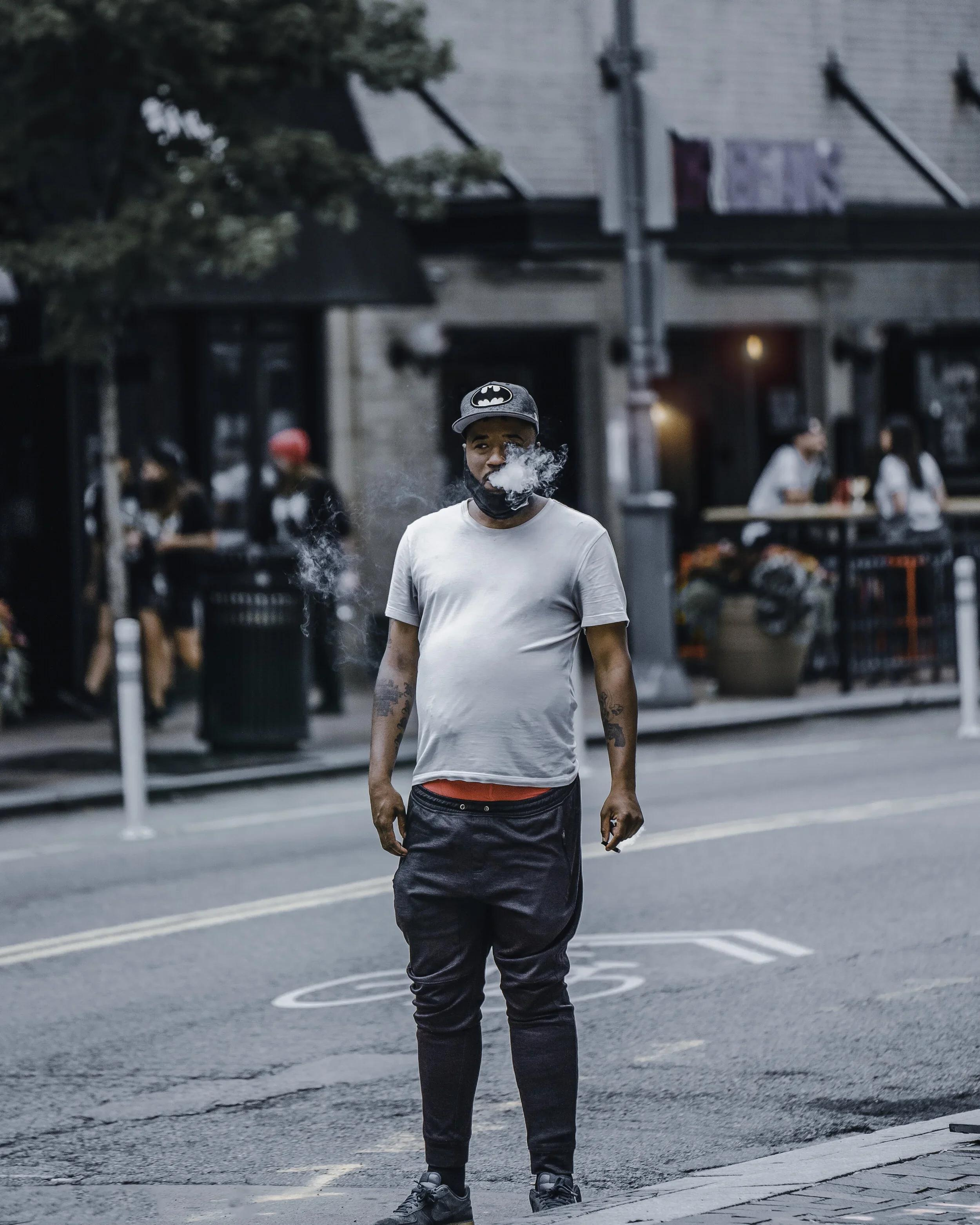 Fog overlay from the Cold Tones kit adding cinematic haze to a city alley while a man smokes
