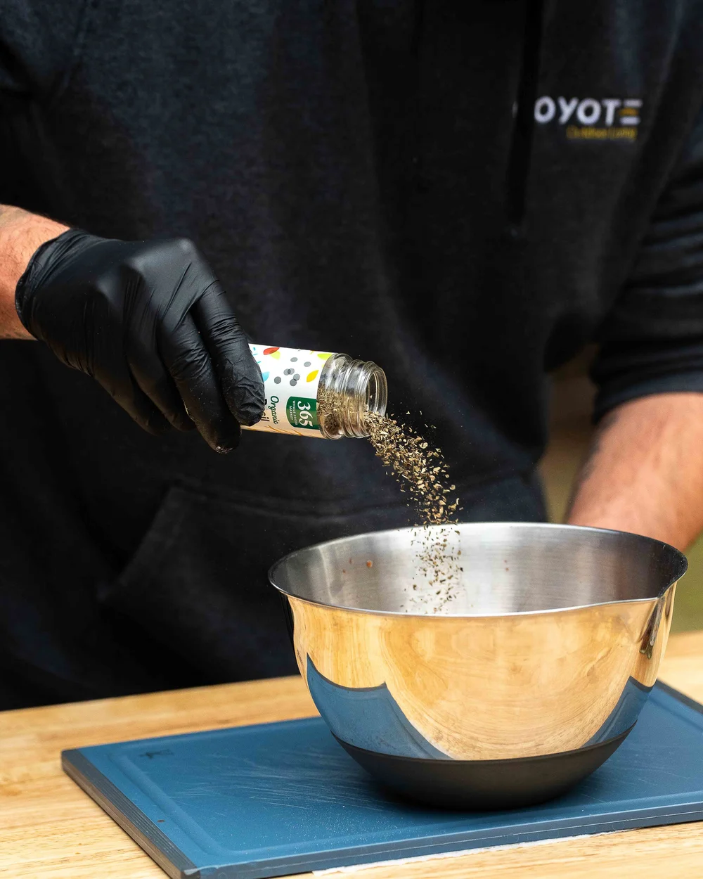 Chef finishing and plating a dish, Pittsburgh chef photography by Ian Jones, ISJDESIGNS