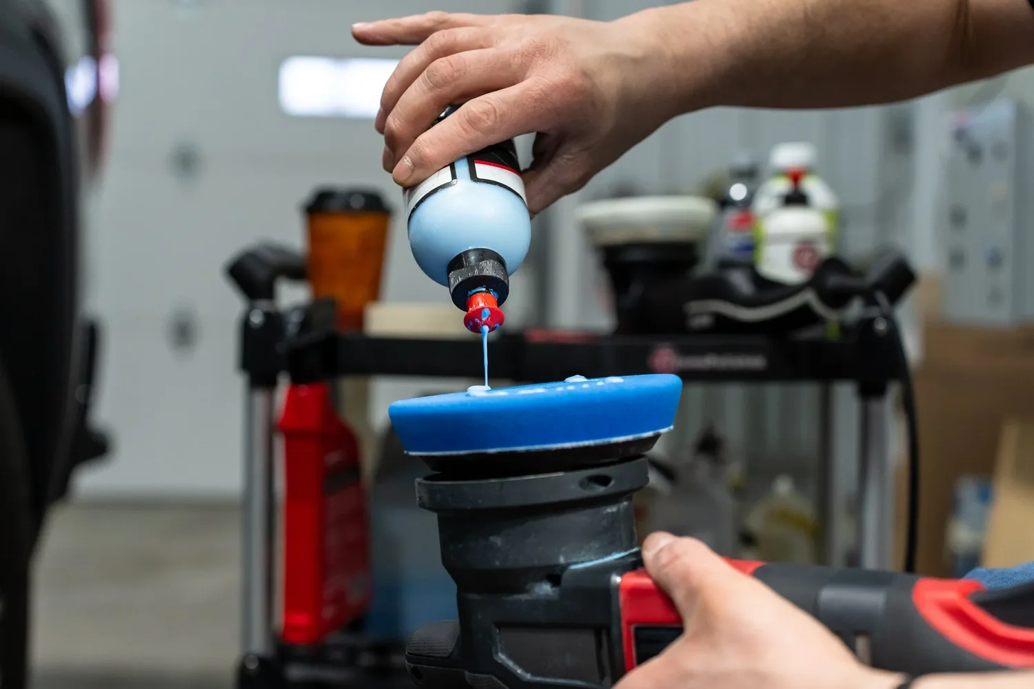 Detailing compound loaded onto a polisher pad mid job, the product doing its work. Ian Jones, ISJDESIGNS.