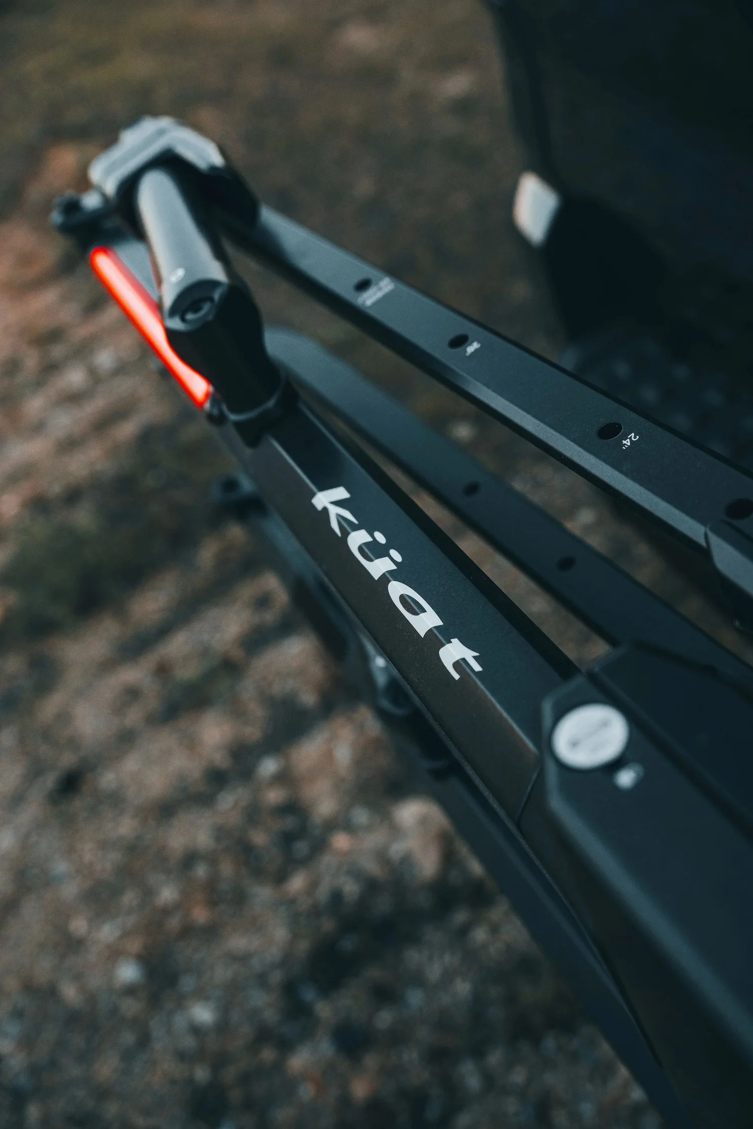 Macro on the Kuat Piston Pro X rail, branding and machined edges at close range. Ian Jones, ISJDESIGNS.
