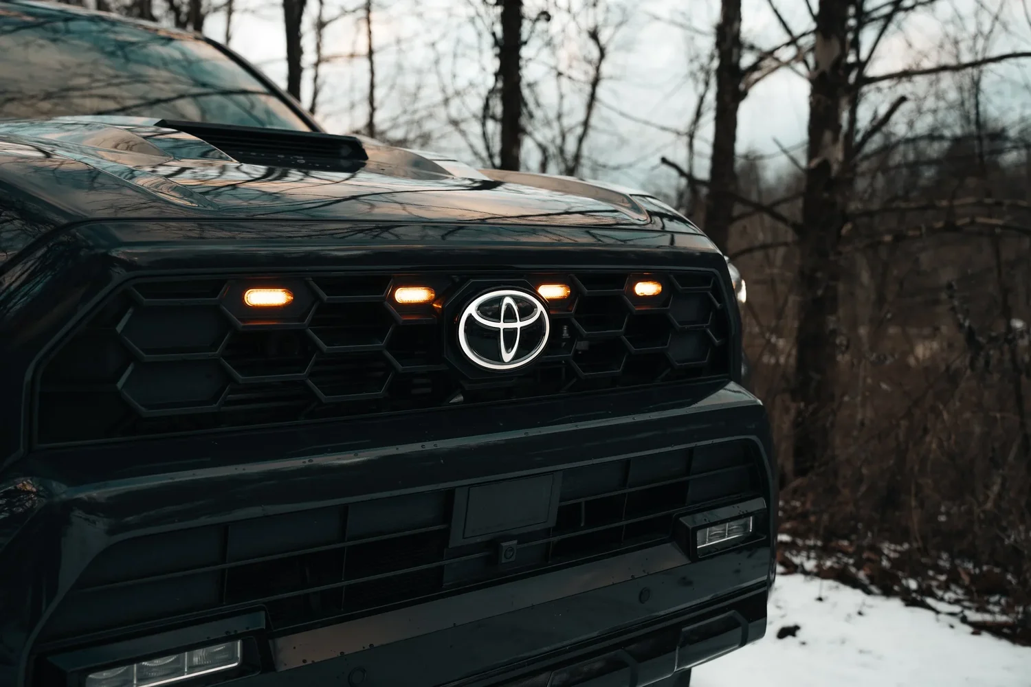 Amber grille lights installed on a 2025 Toyota 4Runner, accessory lit at dusk. Ian Jones, ISJDESIGNS.