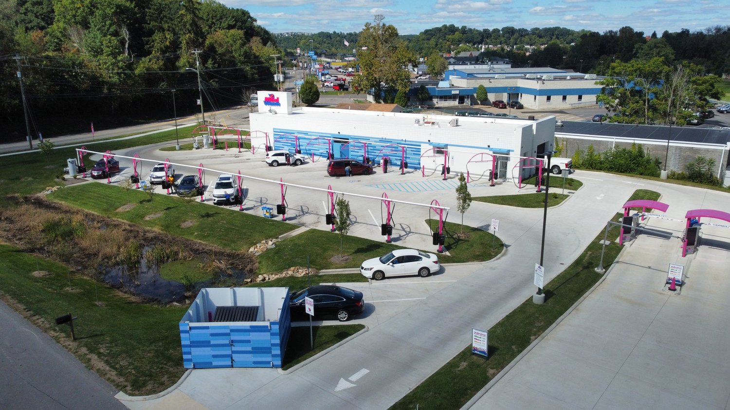 Aerial drone photography of ModWash car wash in Pittsburgh by Ian Jones, showing commercial branding, facility design, and customer traffic flow