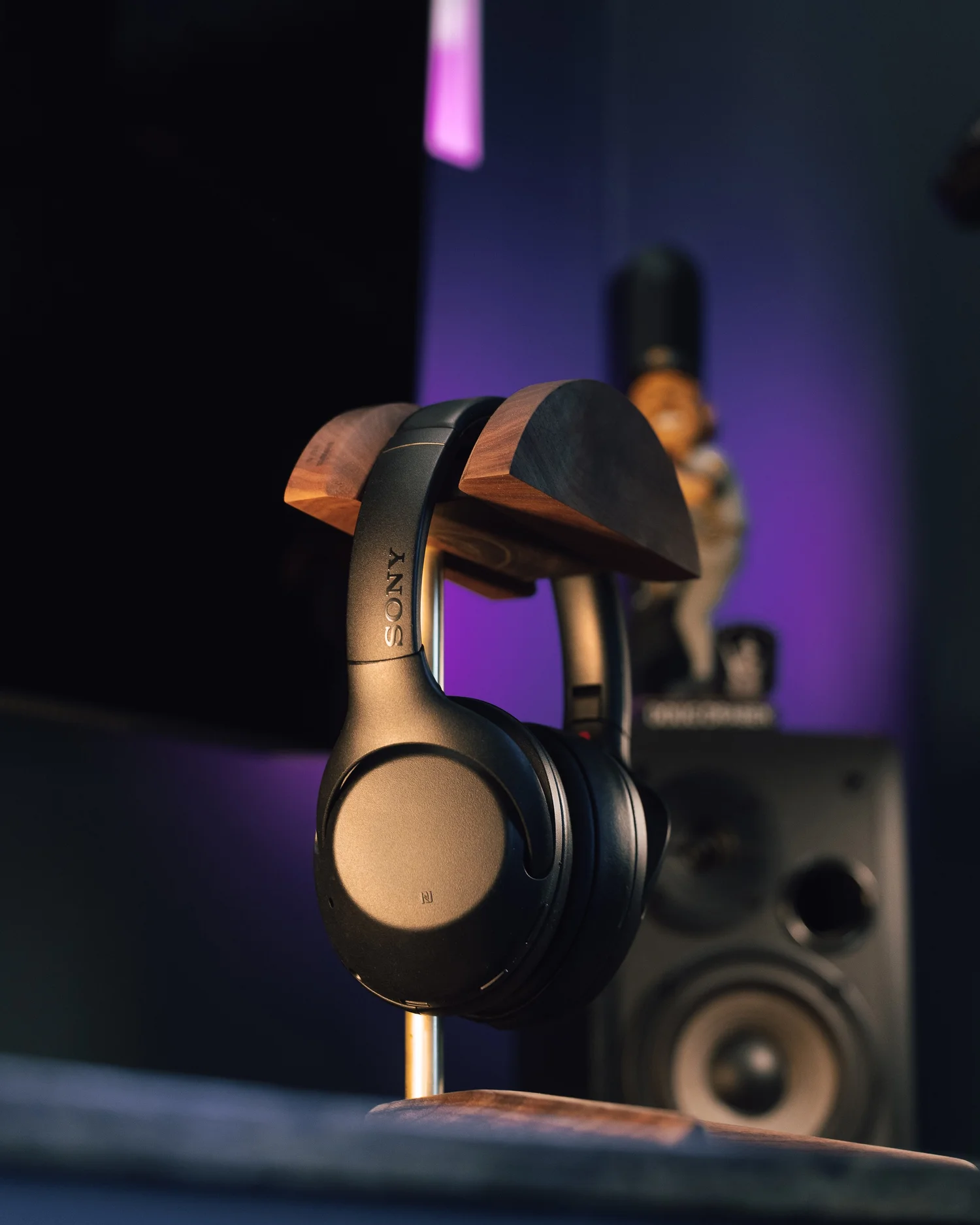 Sony headphones on a wood stand, part of the audio setup used by Pittsburgh videographer Ian Jones of ISJDESIGNS