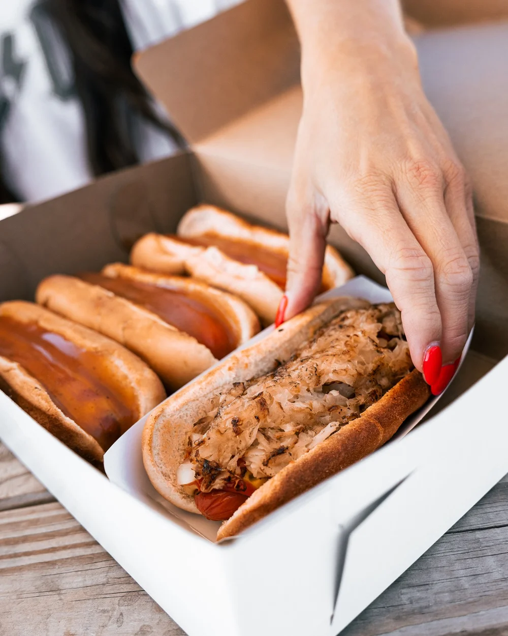 Lifestyle hotdog moment, Pittsburgh food photography by Ian Jones, ISJDESIGNS