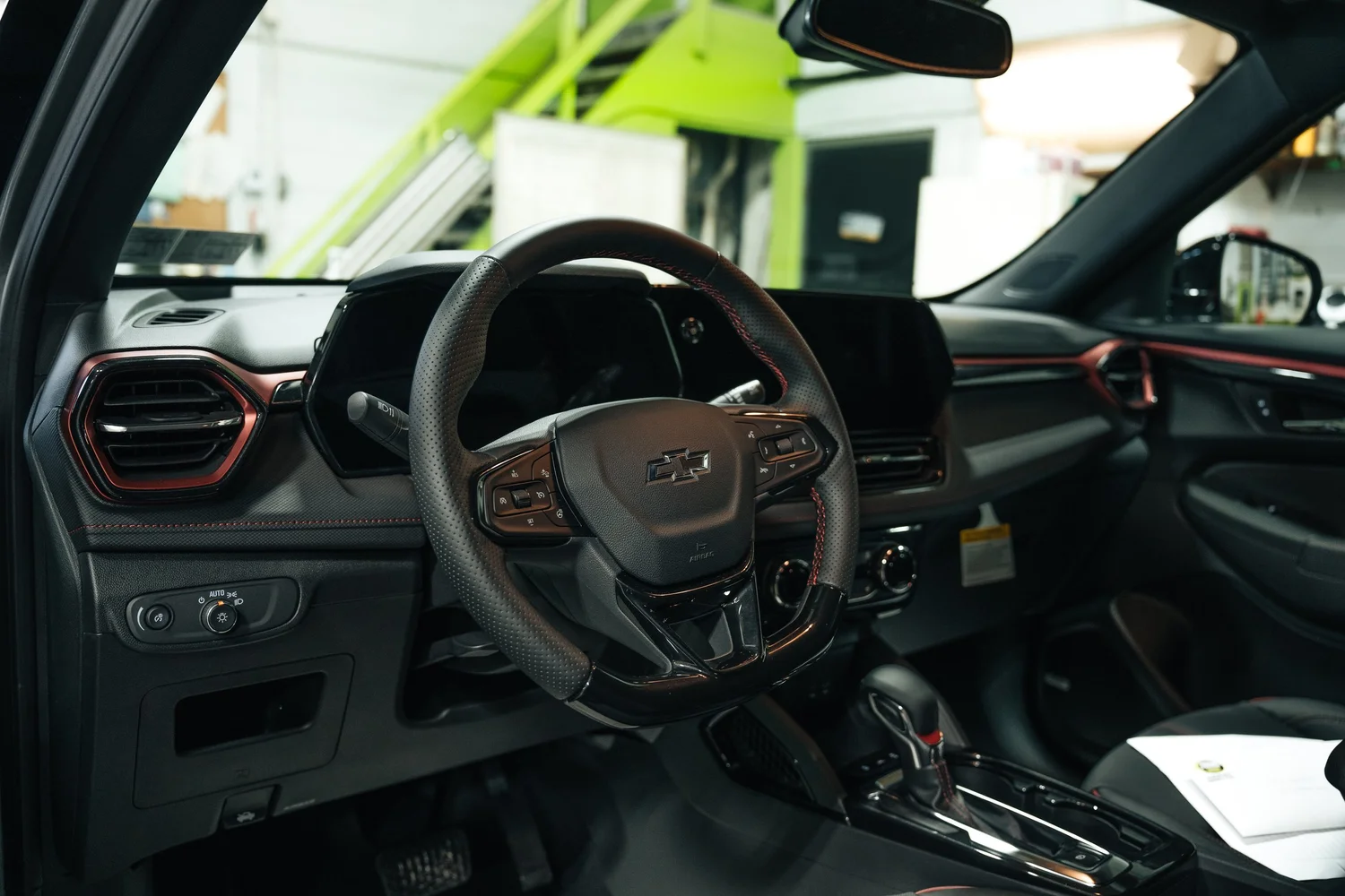 Chevrolet steering wheel, dashboard, and center console interior detail, Ian Jones Pittsburgh automotive photography by ISJDESIGNS for car brands and dealerships