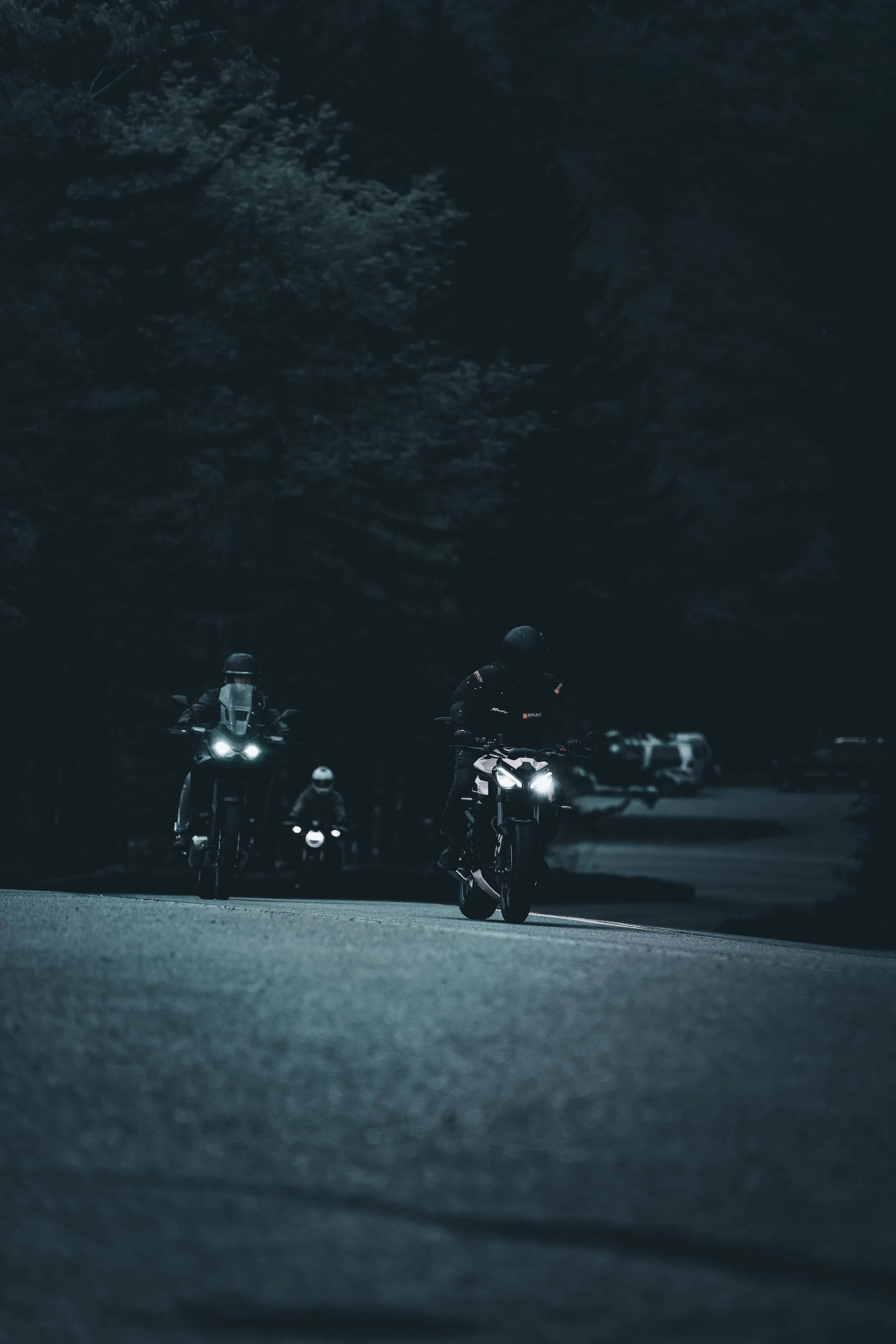 Dynamic night photography of motorcycles on the road in Pittsburgh by commercial photographer Ian Jones