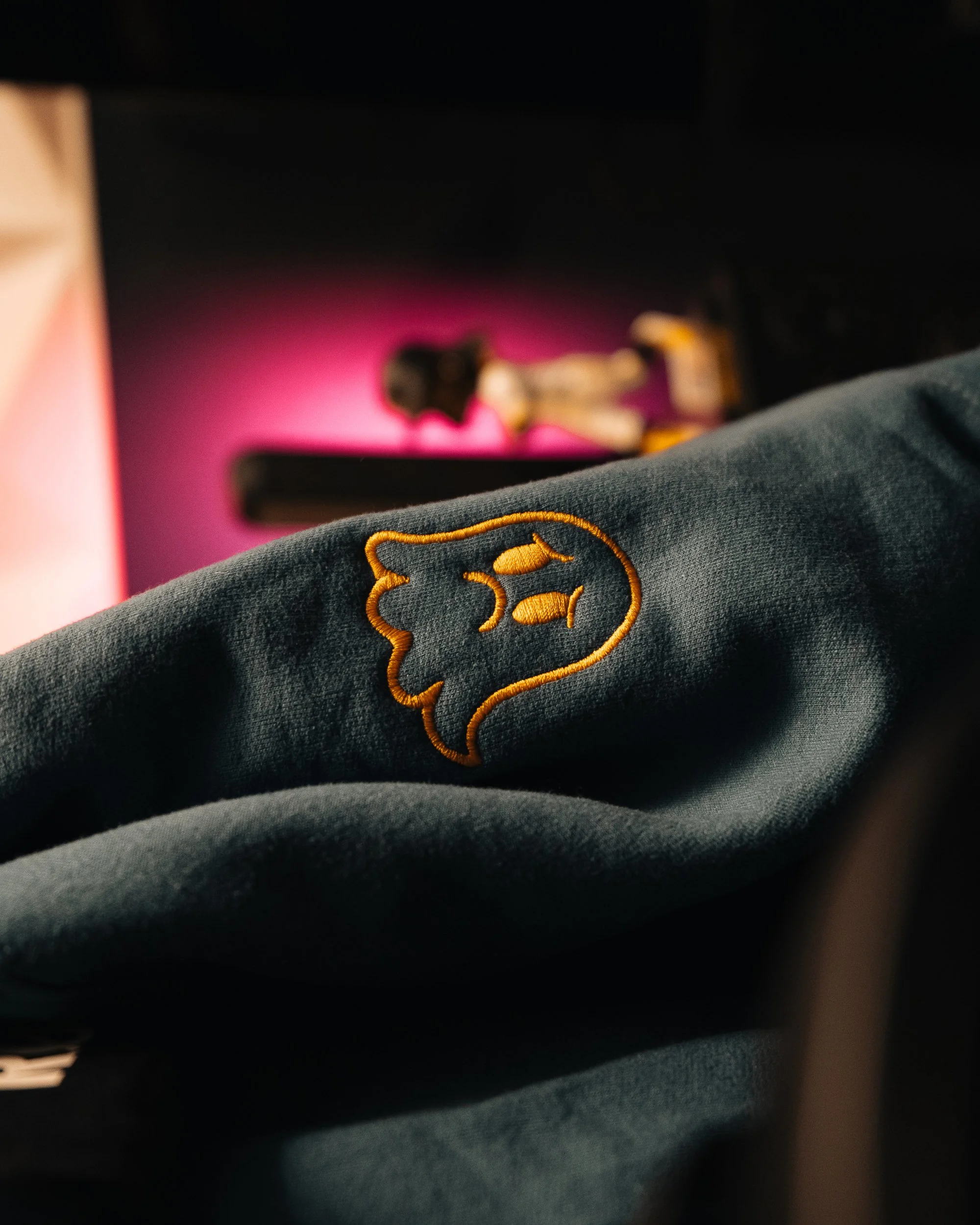 ghosted-hoodie-sleeve-embroidered-ghost-logo-midnight-blue-detail.jpg