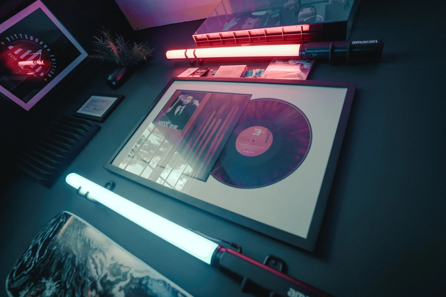 Aputure tube lights and framed record detail inside Pittsburgh creative studio
