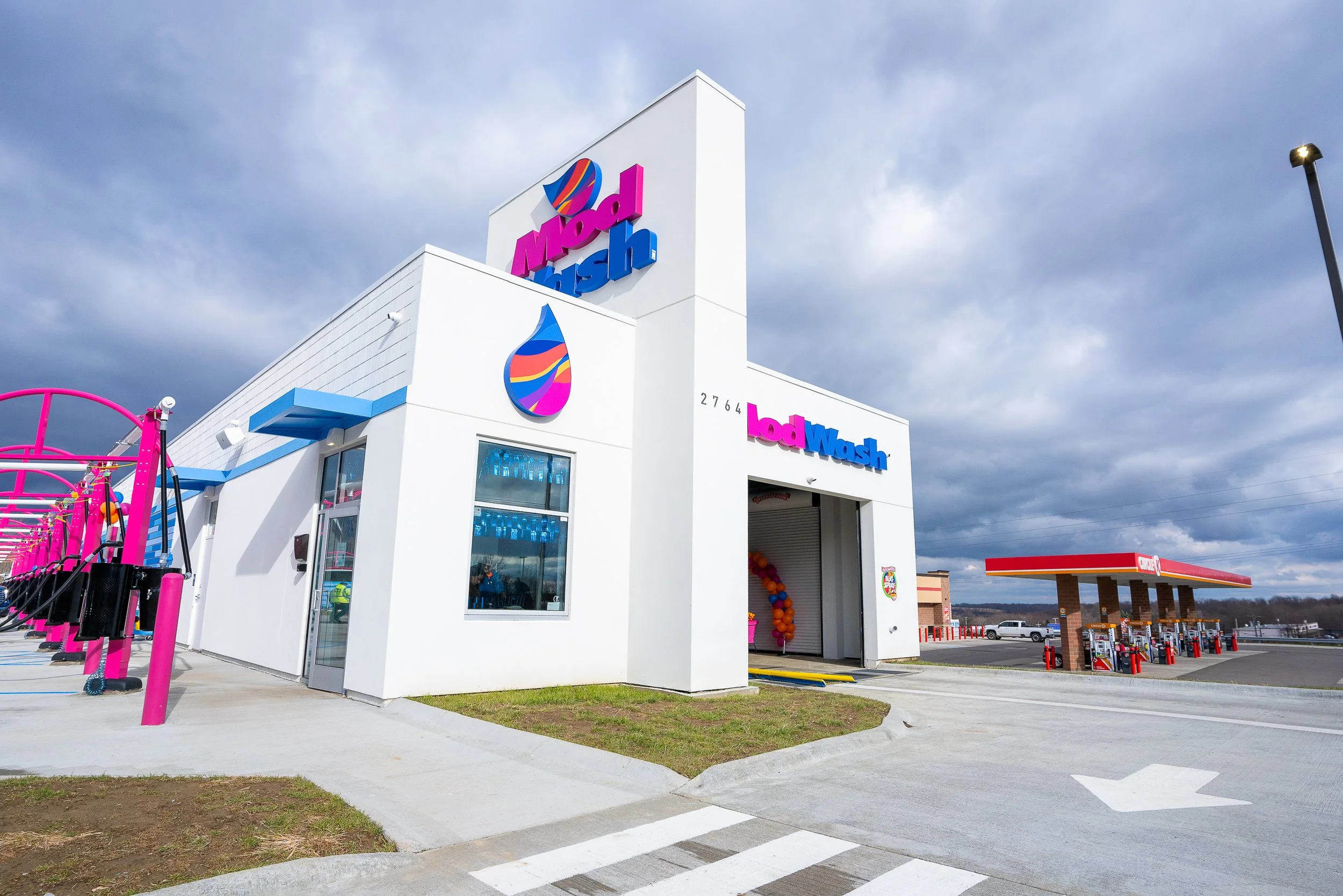 Exterior photography of ModWash car wash in Pittsburgh captured by Ian Jones, commercial and industrial photographer showcasing modern branding and architecture