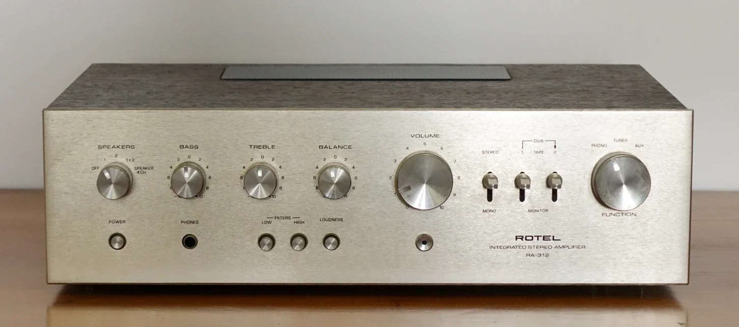 Rotel RA-312 Stereo integrated amplifier 2X speaker systems Phono (turntable) Auxiliary Tuner 2X Tape inputs 4 line level inputs for your iPod, CD player, computer or TV audio. Treble, bass tone controls Loudness Earphones. Tape in/out for tape recording orEqualizer connections. Speaker connections facilitate bare wire and inputs are the universal RCA plugs. Made in Japan $325