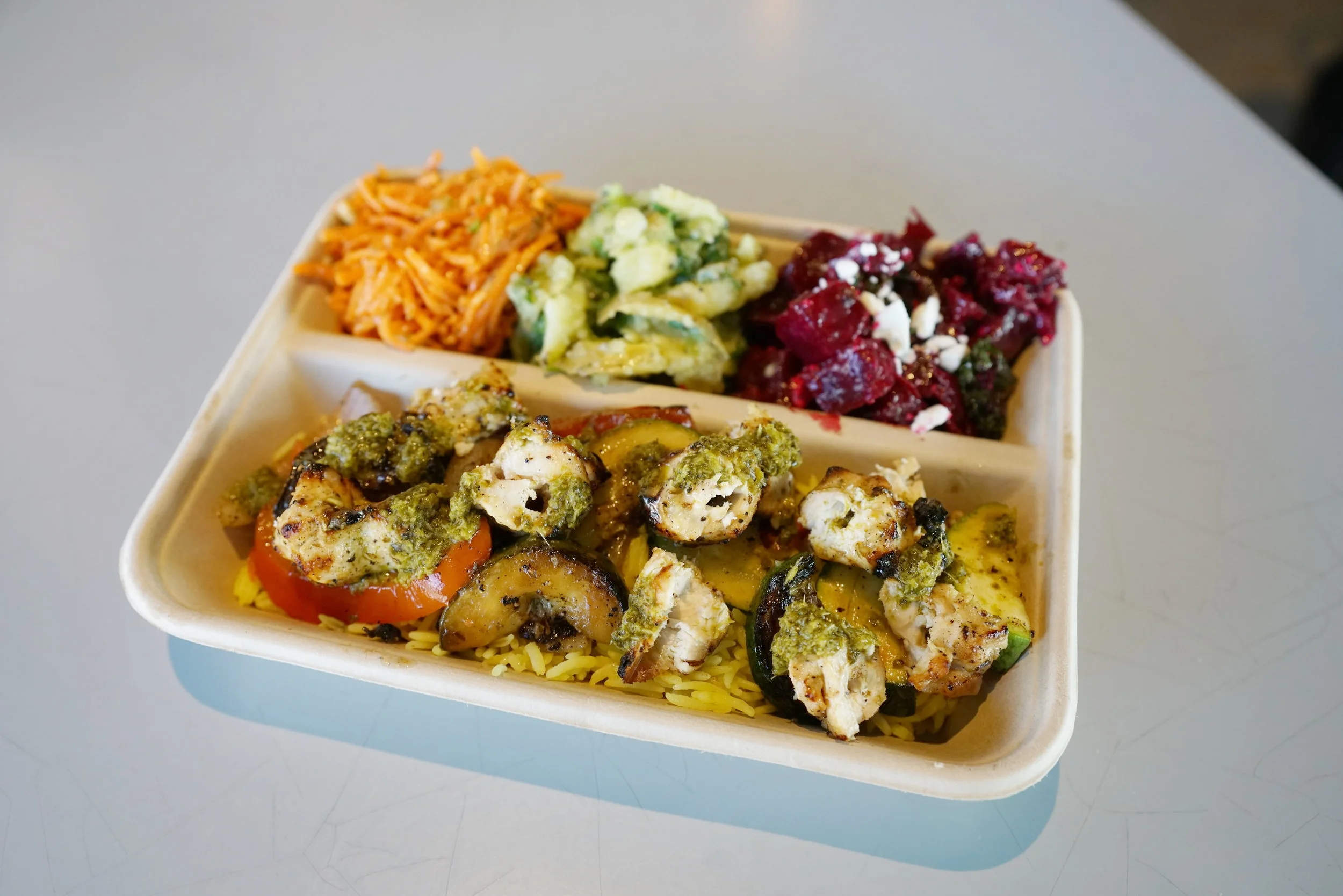 A little descriptions for the sides, from the left: Moroccan carrot salad: Carrots, cumin, dill, olive oil, golden raisins, honey, greek vinaigrette Greek potato salad: Yukon gold potatoes, olive oil, red wine vinegar, scallions Beet and Kale: Roasted beets, feta, mediterranean vinaigrette