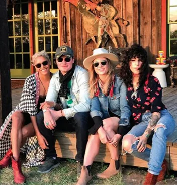 Jersey Banks, Lyon Porter, Shawna Watterson, and Bobbi Rich on the porch at the Rancho Pillow in Round Top, Tx.