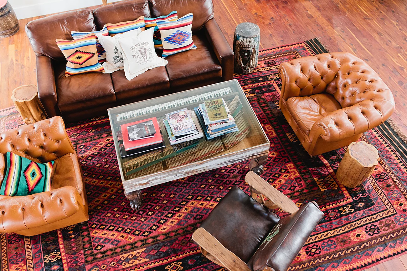 At Wander Inn sink into a velvet sofa or slide into a rocking chair on the porch for views of longhorns. Photo by Kelly Chrstine Sutton
