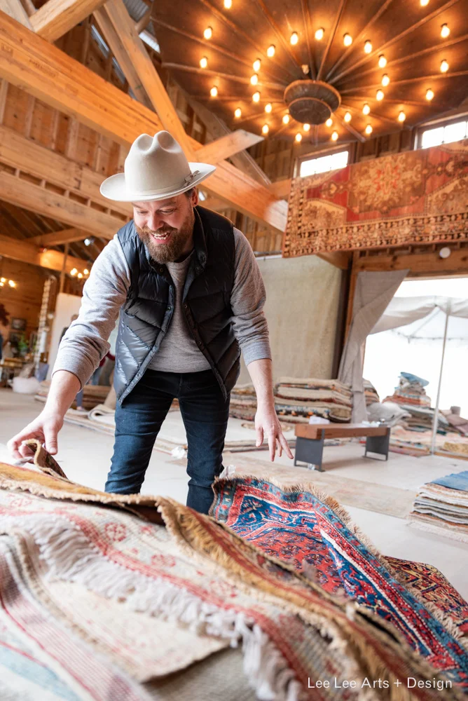 For his Austin client, Phillip was searching high and low for the best antique rugs. He ultimately found the antique rugs he was hoping for at Nomadic Trading Company at Market Hill. Photo by Ashlee Nobel, Lee Lee Arts + Design