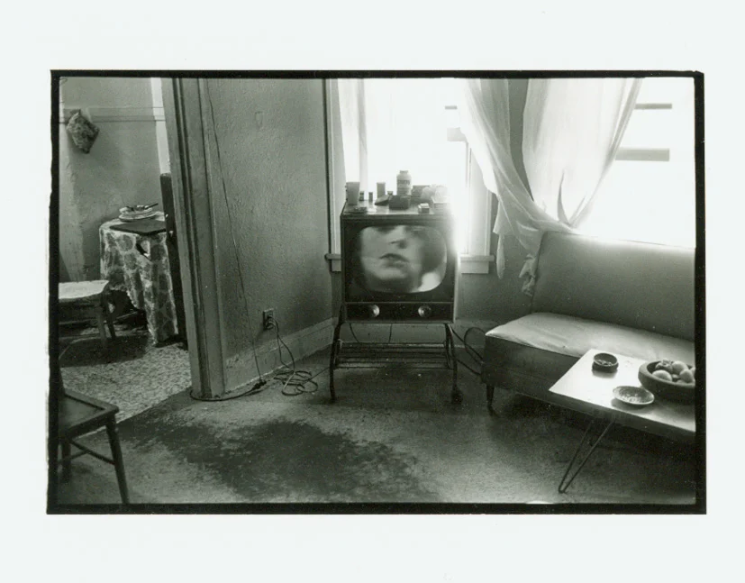   NELLIE, DOWNTOWN L.A.  Gelatin silver print. 1976. Signed, dated and titled. 85 x 127 mm 