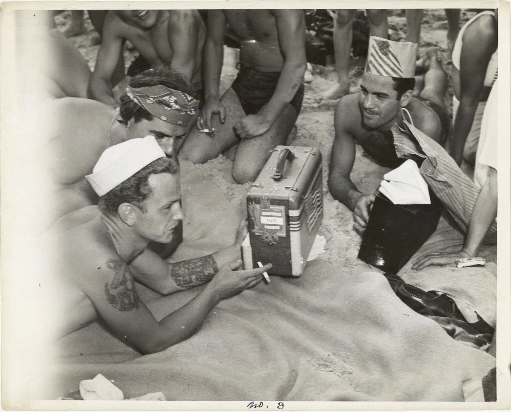 SAILORS, CONEY ISLAND  Gelatin silver print. 1940s. Annotated, titled and with the photographer’s credit stamp. 271 x 336 mm (286 x 356 mm)