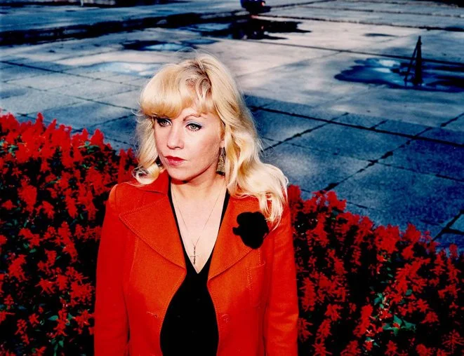   FRAU 2  Chromogenic print, Diasec. 1985. Printed in 2000. From the series 'Komparsen'. Signed, dated and with the photographer's stamp on the verso. 120 × 150 mm 