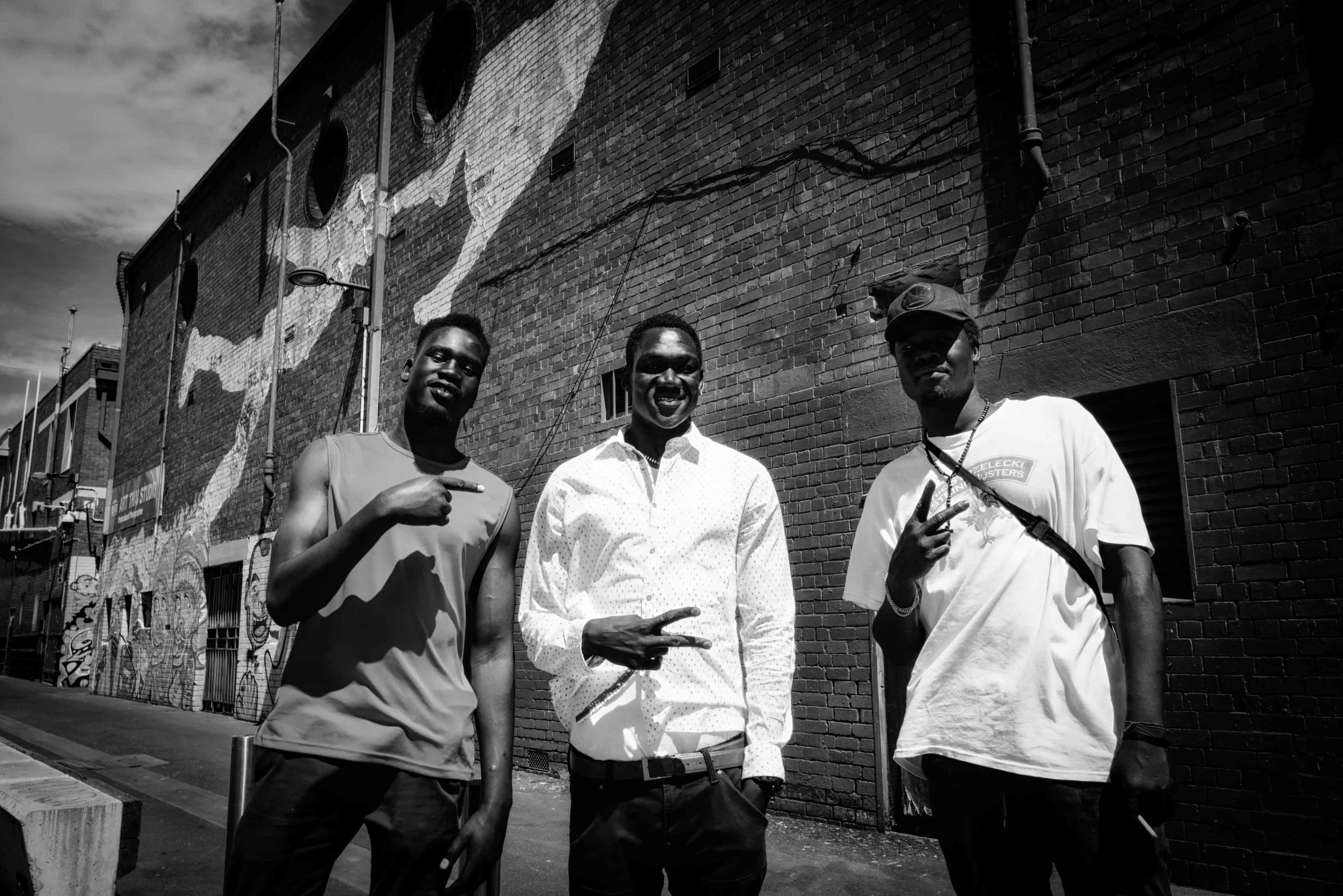 In this image is 29-year-old Torit Chol Bol (centre) with his friends Jay and Pablo. Chol Bol hopes for compassion, unity and equality in the world. ‘What makes us human is what we feel in our hearts. When we see a homeless person, it is what is in our hearts, and our compassion that makes us go and help that person. We see people as people, and it is not based on the colour of their skin.’ Chol Bol told me about his experiences in jail, and how his time there have changed his life. Currently working in construction, he works hard to find his feet, helping his mum and his younger sisters, and in guiding other youth in the area. ‘Many young people here, they don’t have a father figure to guide them. I lost my father back in South Sudan - he died in the war. So nowadays, I look out for the young ones on the streets and I try to be a positive influence for them.’ Through chatting and having a stroll with him through his neighbourhood, his resilience and his compassion really shines through. Seemingly stoic on the outside, he speaks with incredible warmth and honesty. ‘I really love to express myself through music,’ he says, ‘I’m going to title my next album ‘unbroken’. When you have been where I am, people try to break you. I must remain strong, and not let that happen’.