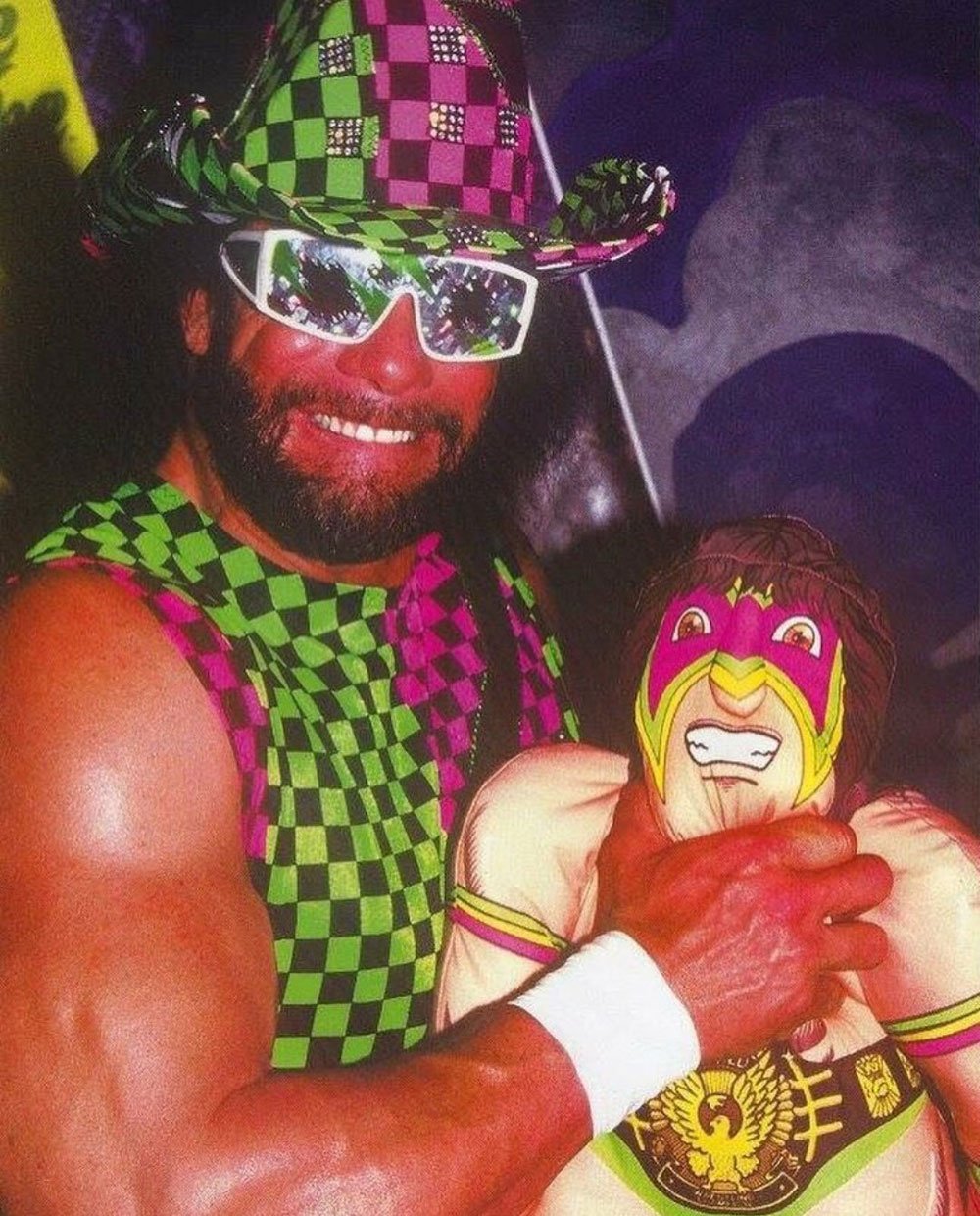 Macho-Man-holding-Ultimate-Warrior-plush.jpg