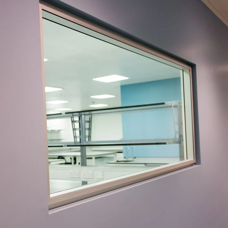 Looking through from a write-up room into a lab