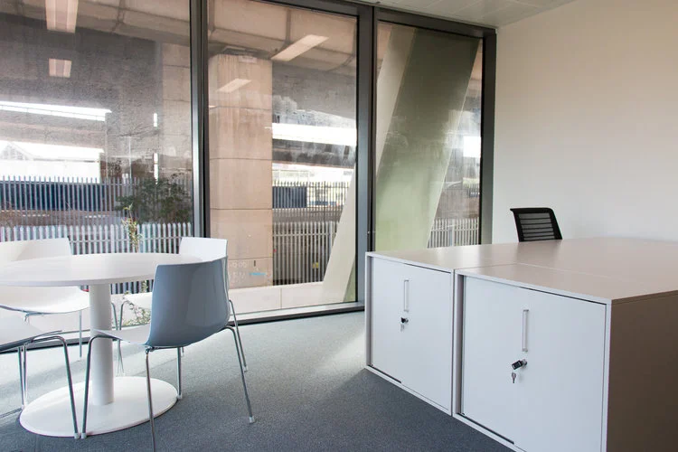 Office space with storage and a breakout area