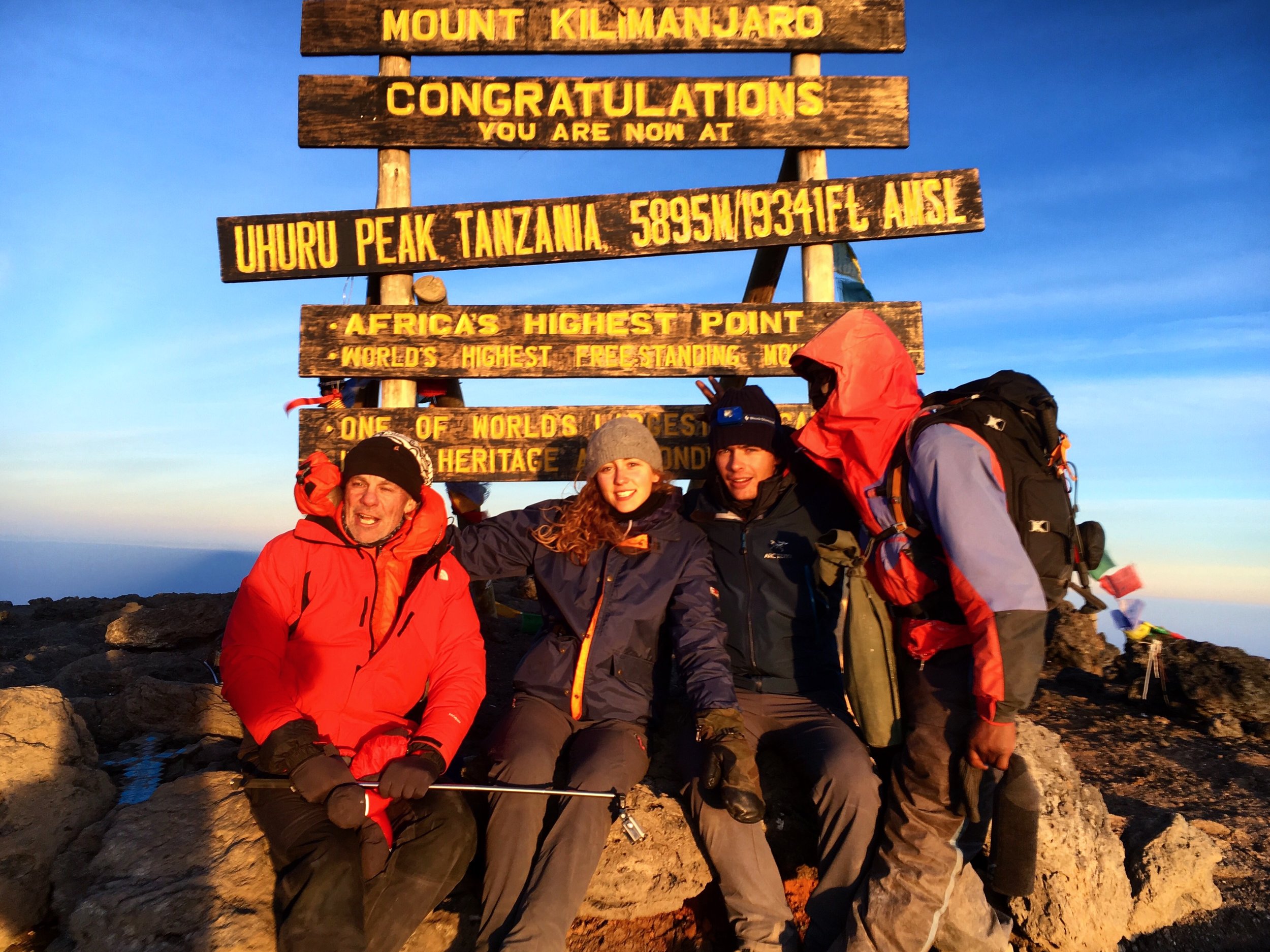 Taken by Micheal with my phone at the summit. From left to right: Graham, myself, Nico and Joseph. My favourite picture by far! (Note how swollen we are because of the altitude...#sexyallthewayup)