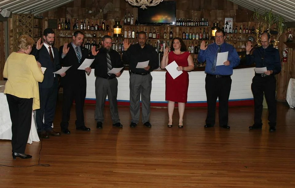 Left to right: Tina Wetter, Mike Kane, Demetri, Mike Westman, Steve Emanuel, Angie Roche, Sean & Mark Tolbert.
