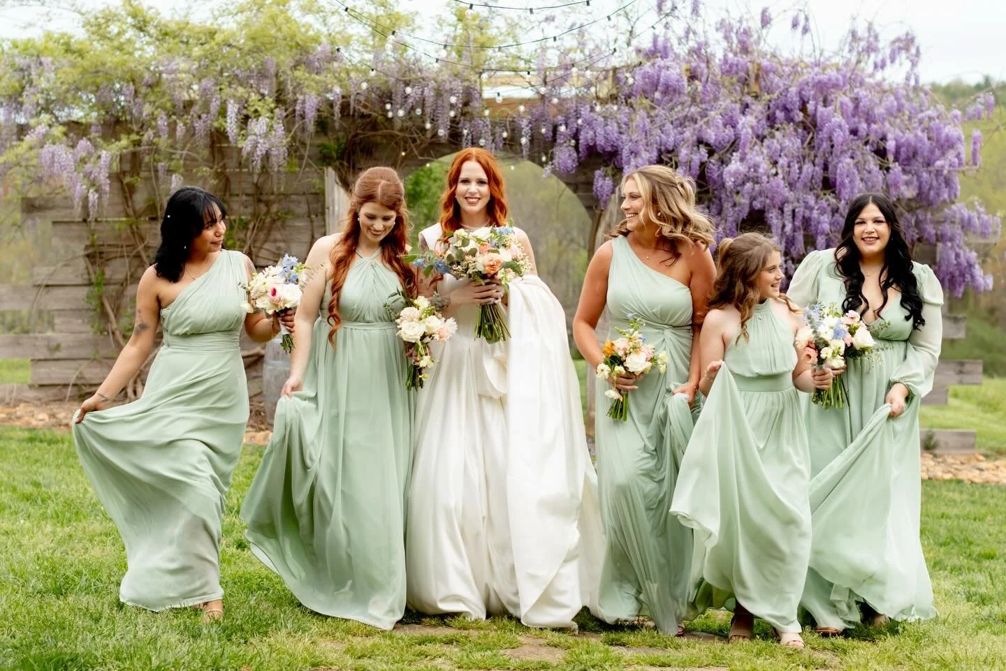 While it&rsquo;s sleeting outside imma just think on ☀️ and wisteria bloom days! Isn&rsquo;t Alexa so beautiful with her bridesmaids?! Alexa now calls NC home so go follow her @graceandblooms! Thank you @keithandlakynphotography for the beautiful pho