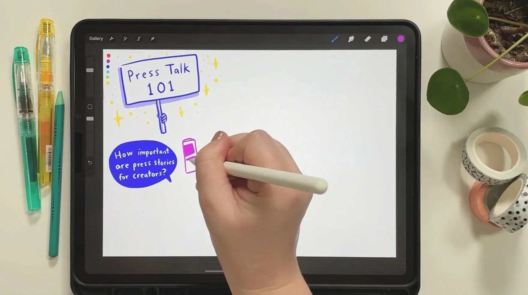 A hand does live scribing on a tablet, writing “Press Talk 101” and “How important are press stories for creators?” with a stylus.