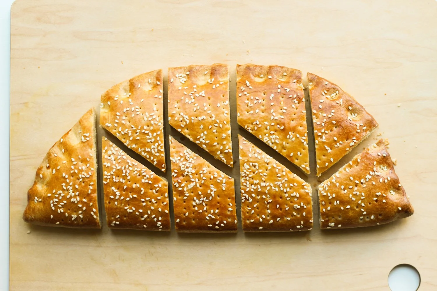 Kadeh (roux-stuffed brioche) This sweet roux-filled bread is rich with tradition, and as far as I know, it's totally unique to Assyrian cuisine. The loaves are usually prepared in very large batches (although my recipe "only" makes two loaves), often by large groups of people, and they're cut into this beautiful trapezoidal design right before serving. Kadeh is usually served at holidays and special occasions, or simply with chai when you have your favorite guests over.