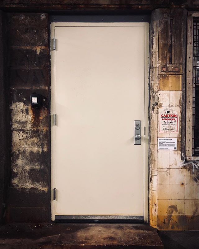 Title: Door to Wonderland, Chambers St (J,Z)

Found in nearly every station, portals like this invite transit riders to question the nature of what is real. That few have ever been seen open has even given rise to the idea that these doors are fake, 