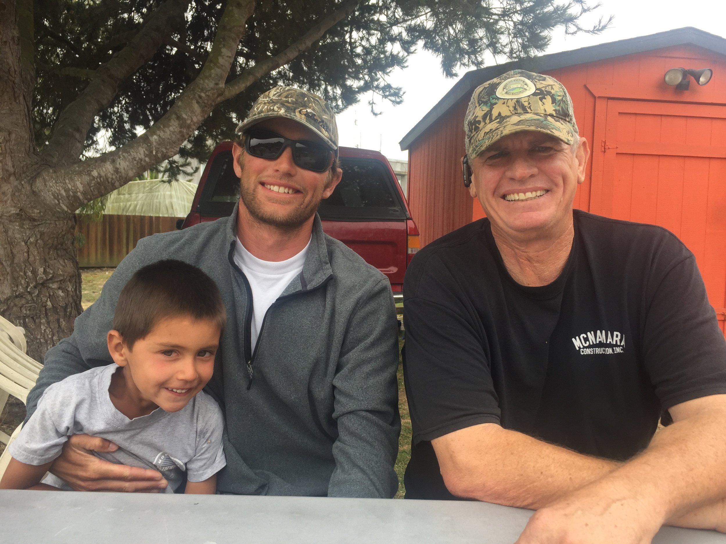 Lost Gear Recovery Team members Calder Deyerle (with his son and deckhand, Miles) and Darryl Donovan.