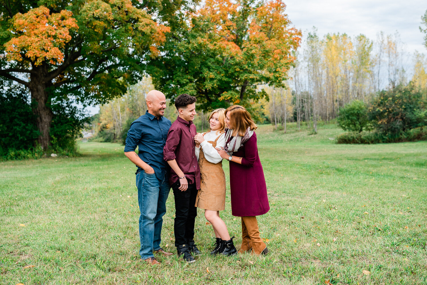 family-standing-fall-leaves-ceciliasmithphotography-fortdrumphotographer-2.jpg