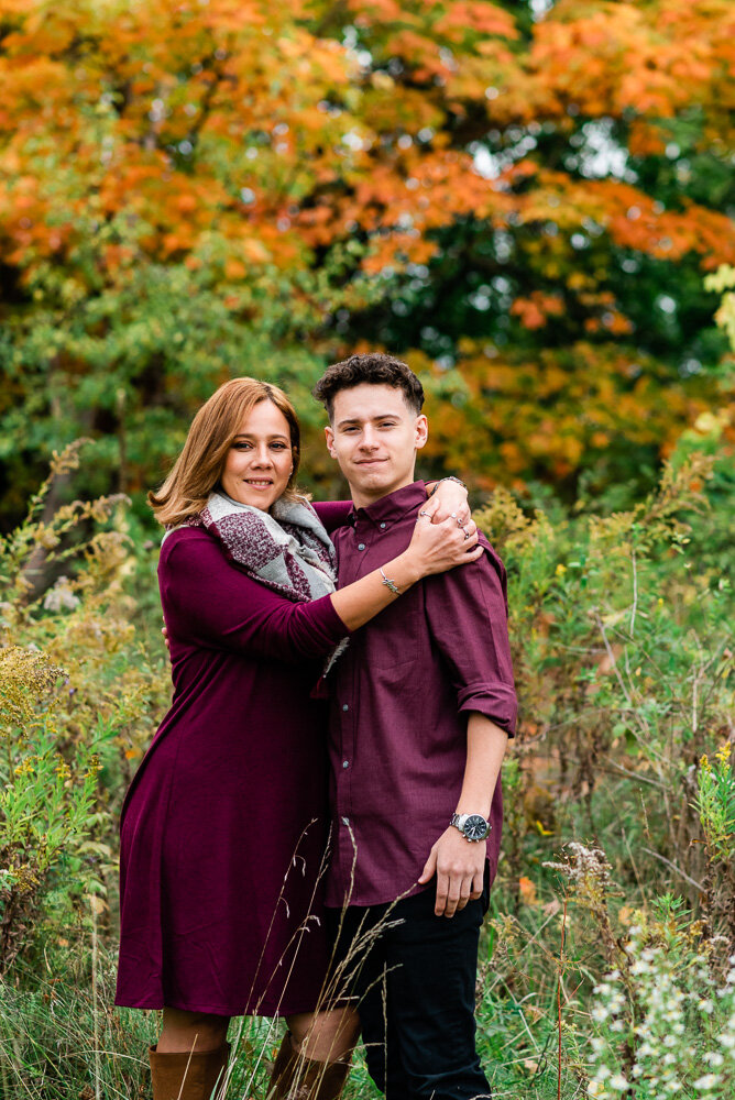 mother-son-standing-fall-leaves-ceciliasmithphotography-fortdrumphotographer.jpg