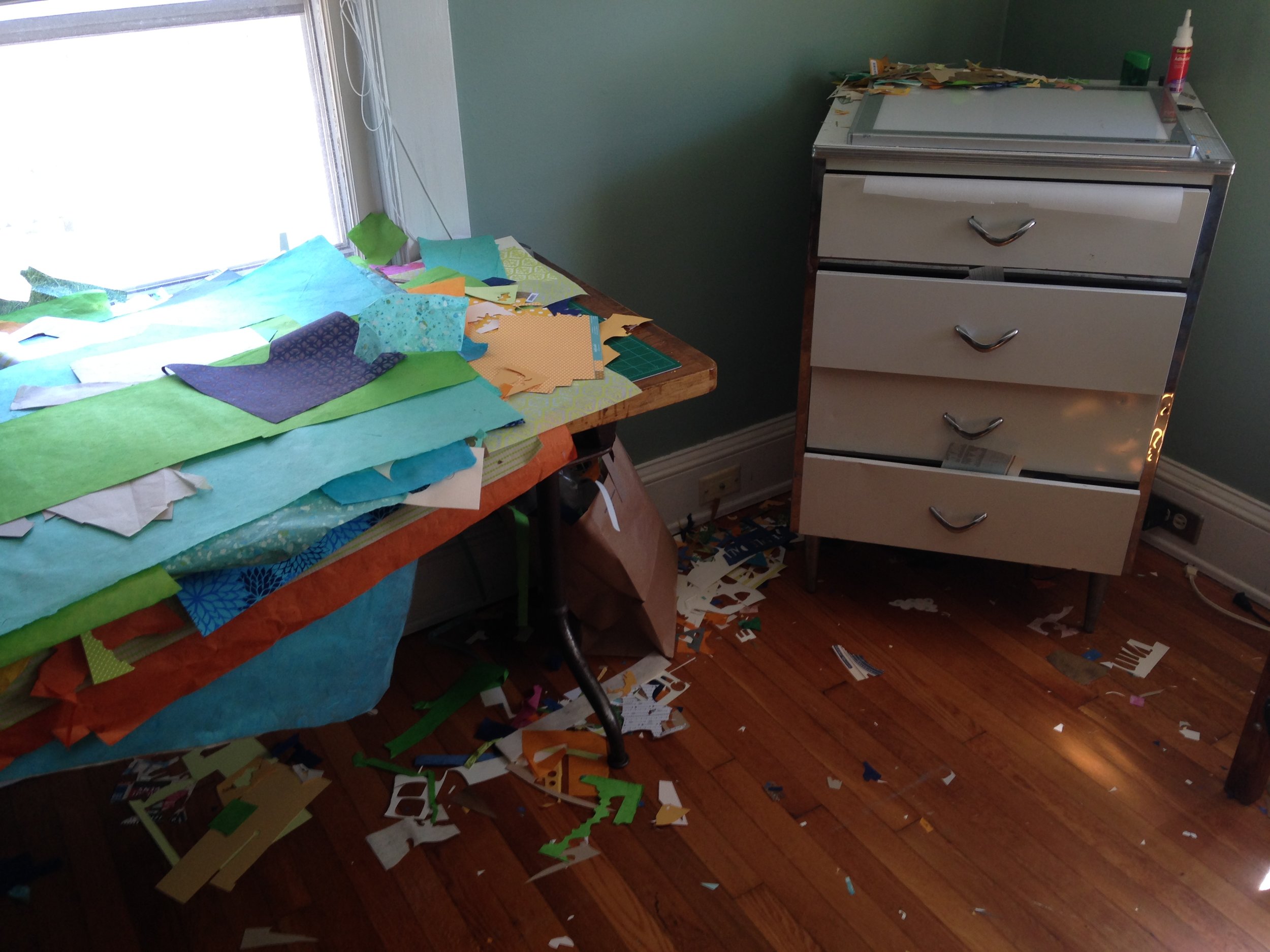 The aftermath of a picture book. I’m usually finding bits of paper from a book months after I’ve finished it. The paper gets EVERYWHERE!