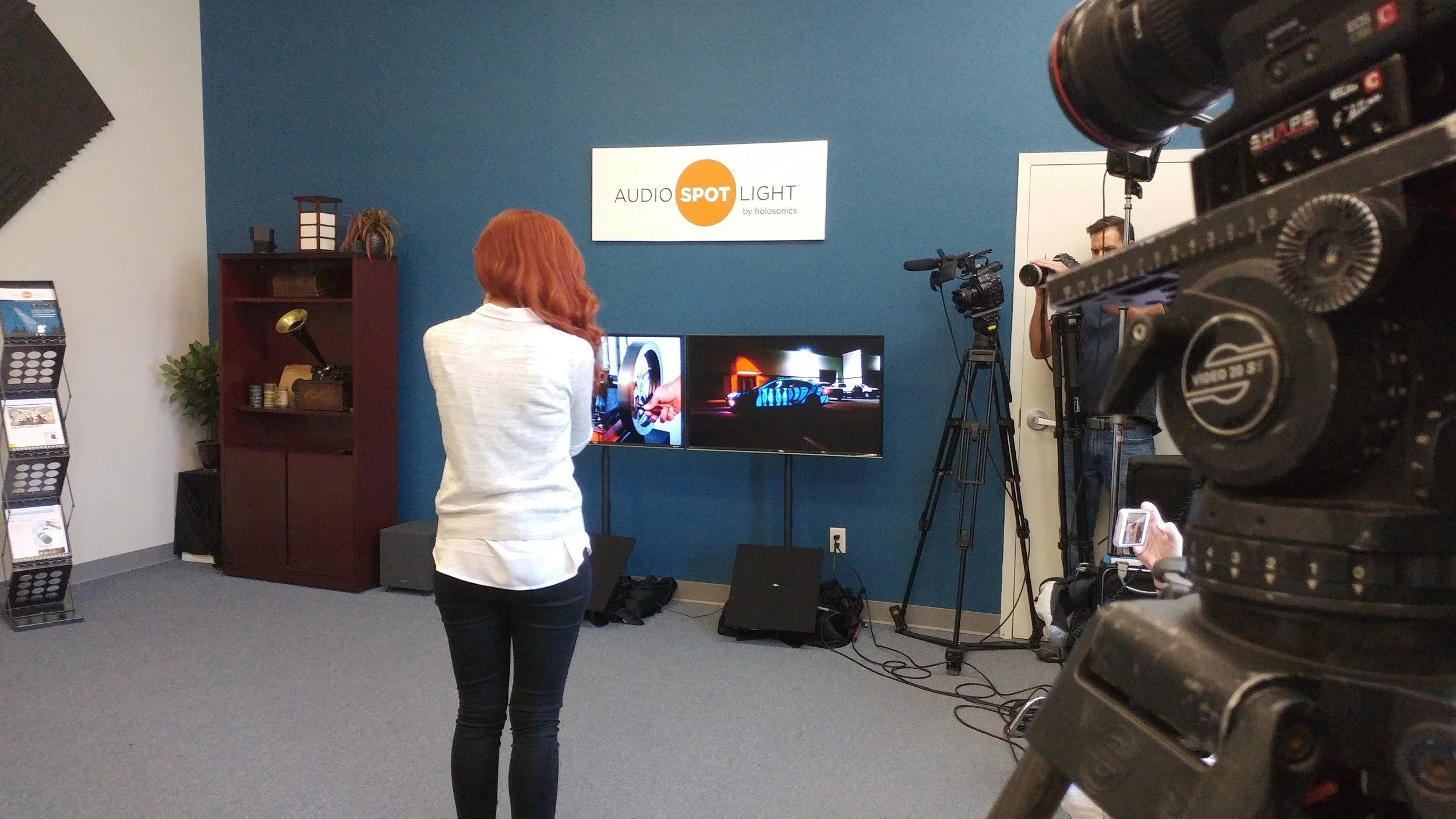CBS correspondent Alie Ward gets a firsthand demonstration of Audio Spotlight technology 