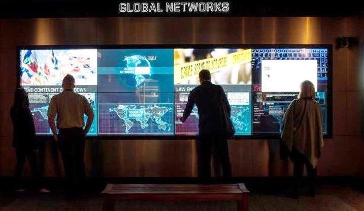 With sound from four ceiling-mounted Audio Spotlight speakers, patrons view the Global Networks exhibit