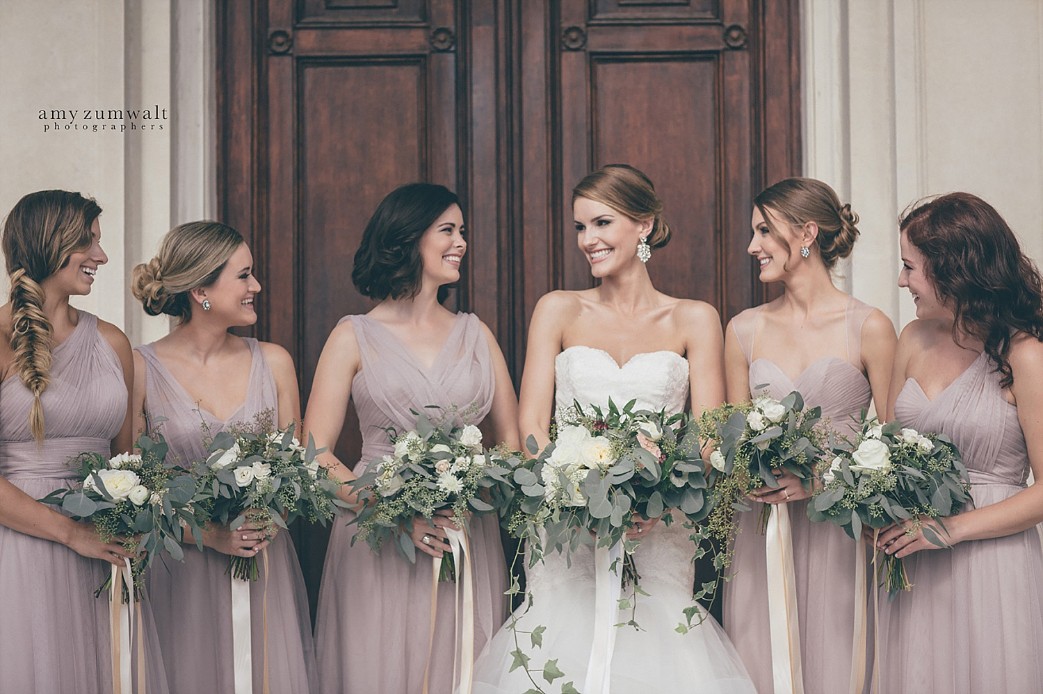 Dallas Scottish Rite Library and Museum wedding bridesmaids in taupe bridesmiad dresses and greenery and white bouquets