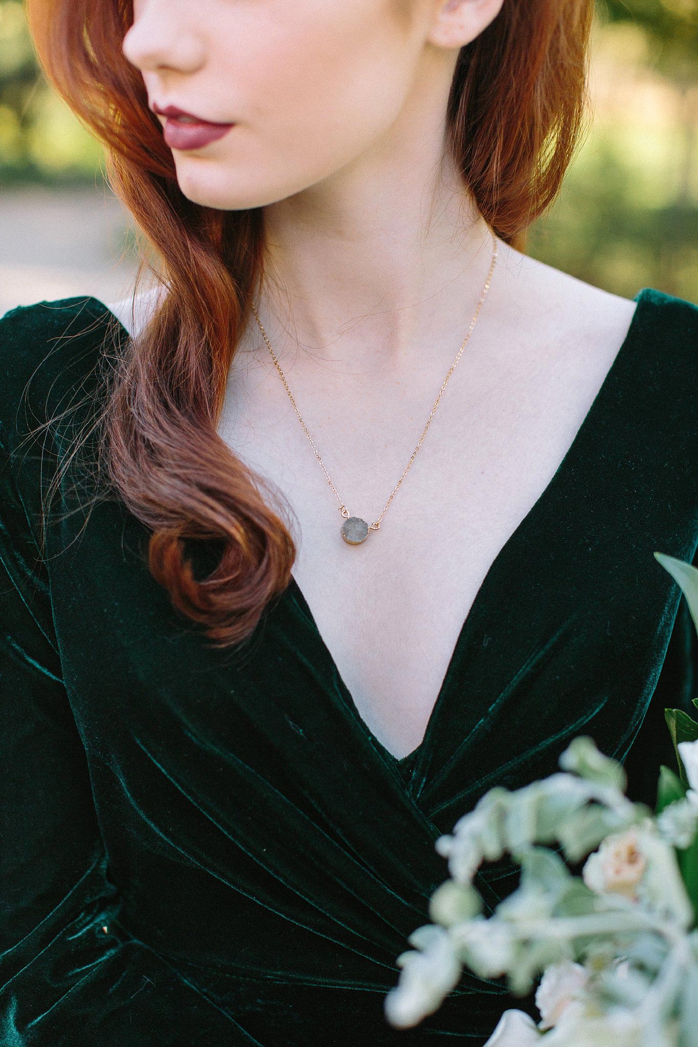 aristide mansfield wedding greenery dress with jewel necklace