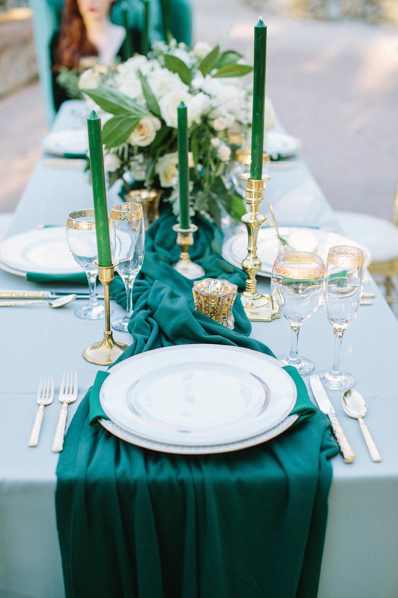 aristide mansfield wedding grey reception table with green runner and gold plates