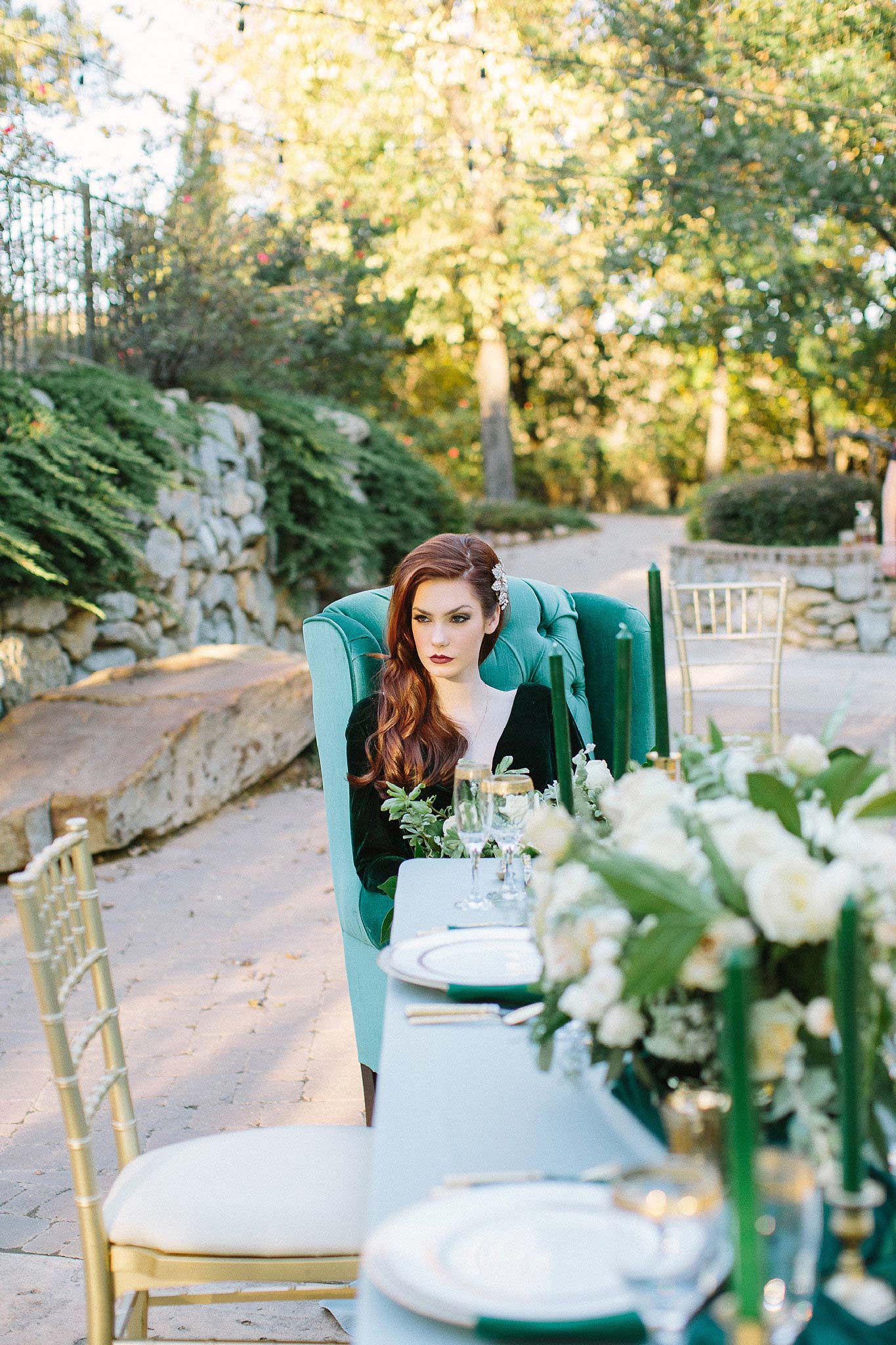 aristide mansfield wedding bride with red hair sitting at the end of the table